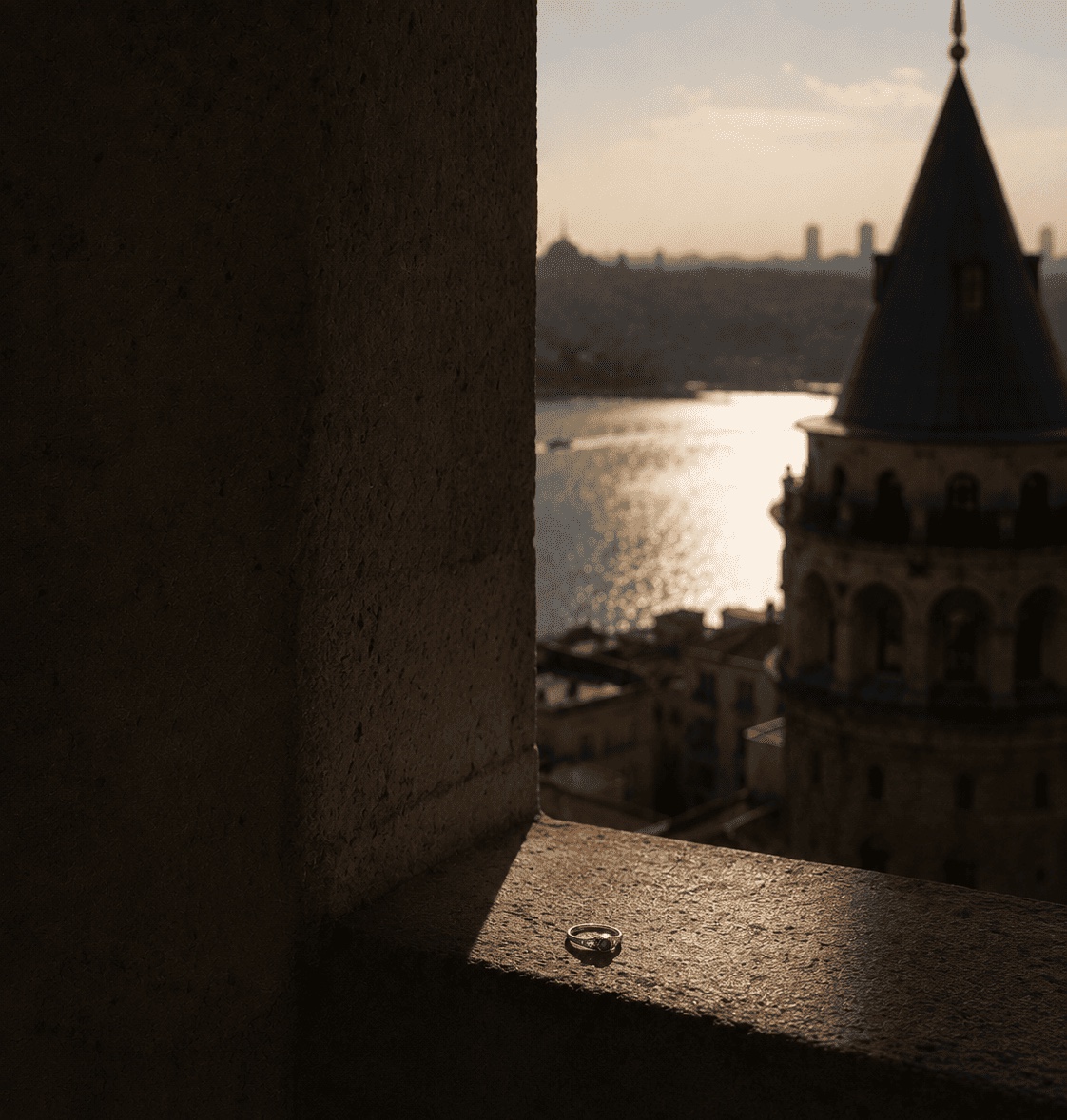 An ALARÉ ring on a stone ledge above the Bosphorus